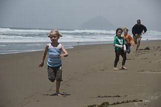 Camping kids playing in beach